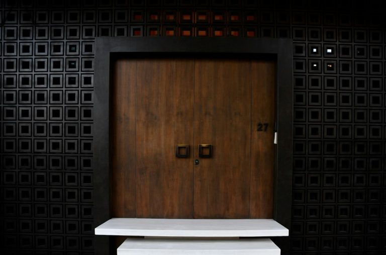 Modern front door representing home entrance security