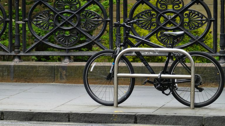 A bicycle secured with a lock in a city street
